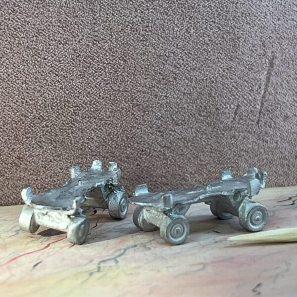 Vintage miniature rulleskøjter i metal