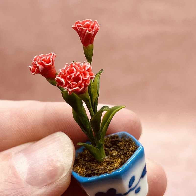 Røde Nilliker i miniature til dukkehus